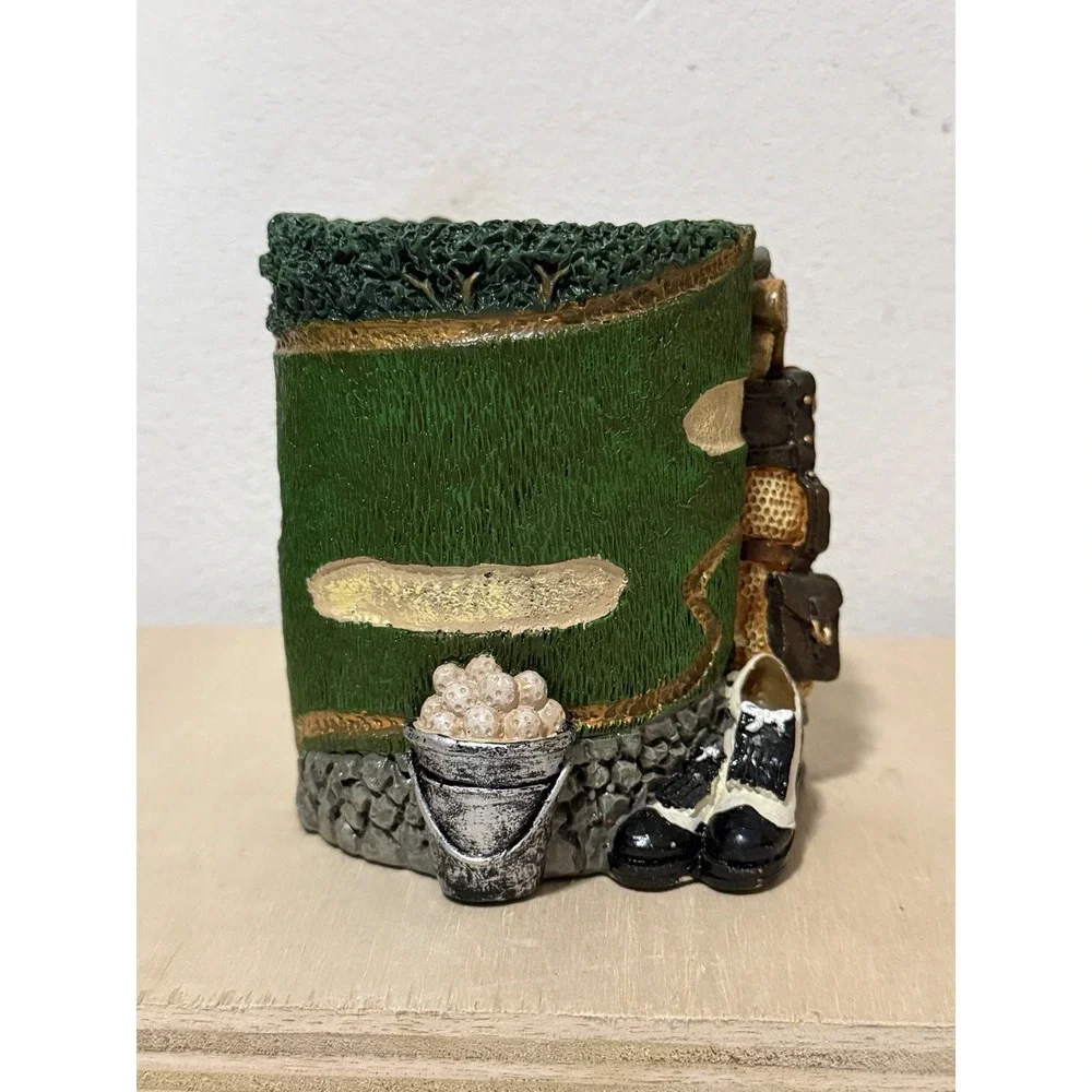 Figi Graphics golf-themed resin bank or pencil holder
